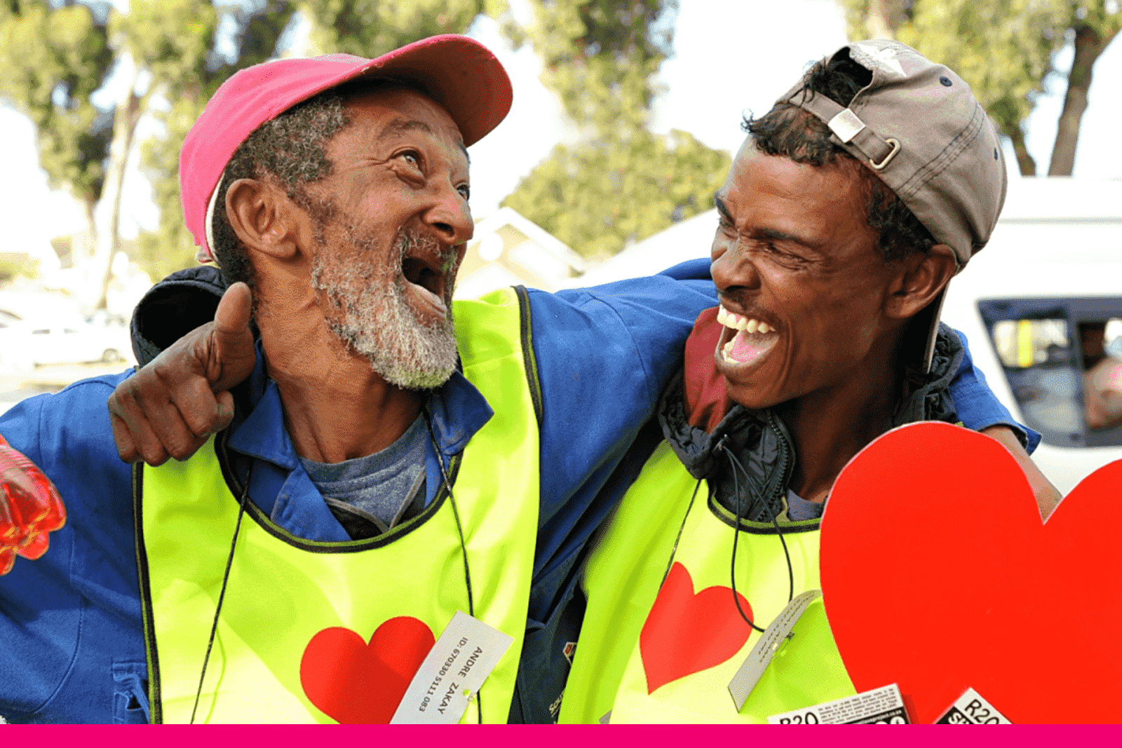 Two destitute men enjoying their donation in the Secret Love Project Sellers program