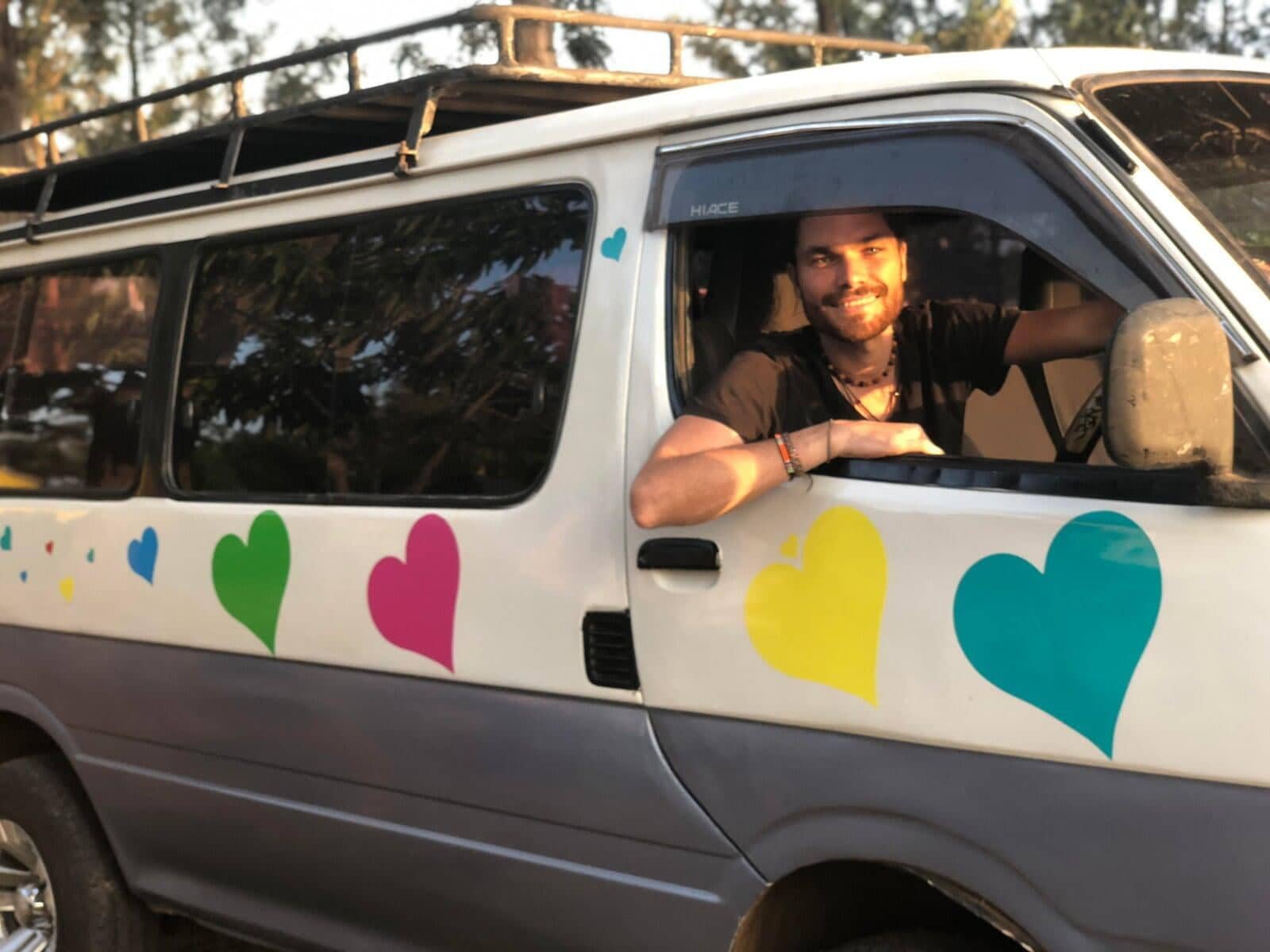 A car decorated with The Secret Love Project heart stickers