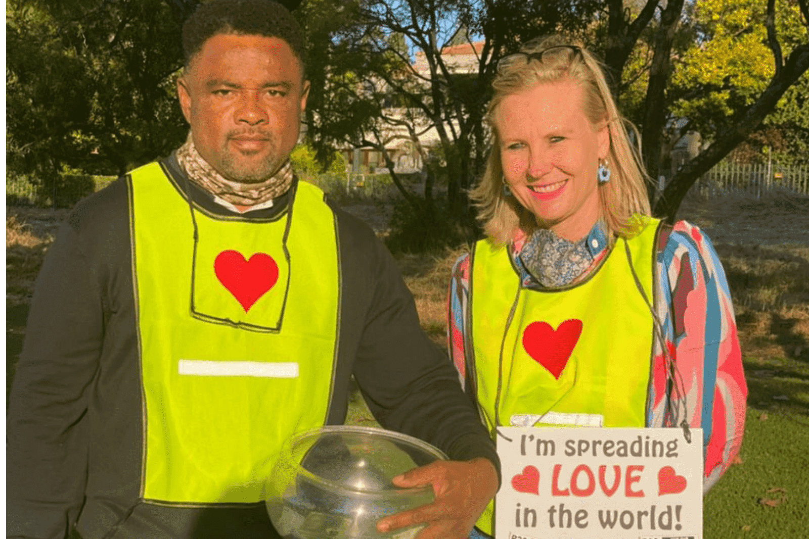 One of The Secret Love Project Volunteers with a Sticker Seller