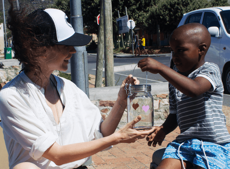 A volunteer for The Secret Love Project at a non-profit charity event